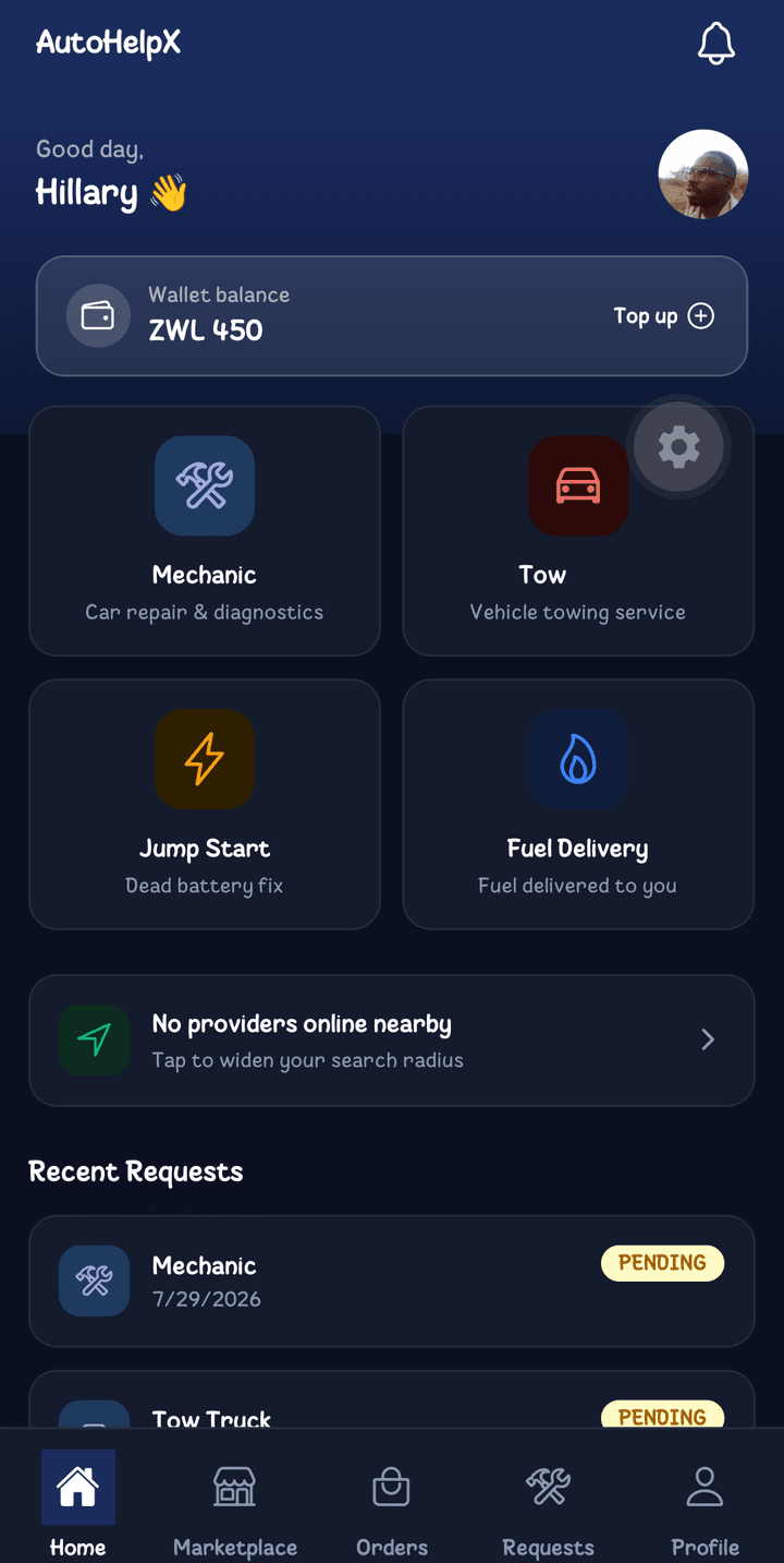 AutoHelpX home screen: wallet balance, and one-tap requests for a mechanic, tow truck, jump start or fuel delivery.